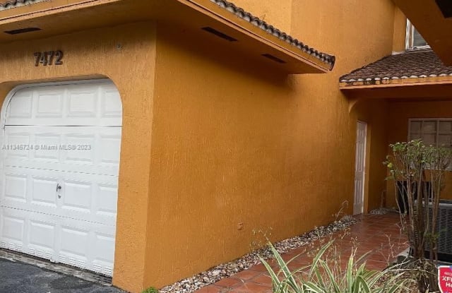 7472 NW 176th St - 7472 Northwest 176th Street, Country Club, FL 33015