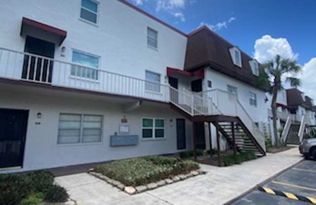 Beautiful water view ground floor condo in desirable town and country photos photos