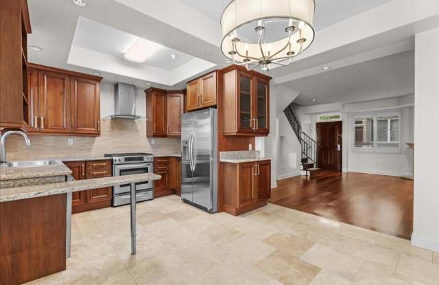 Spacious 3-Bedroom Tri-Level Townhome with Private Balcony in Prime NoHo photos photos