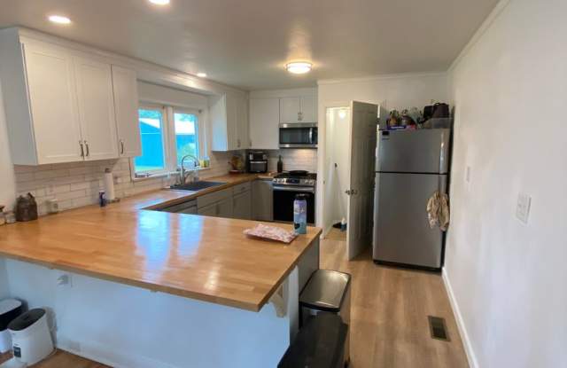Beautiful 3 Bedroom House with Large Fenced in Backyard! photos photos