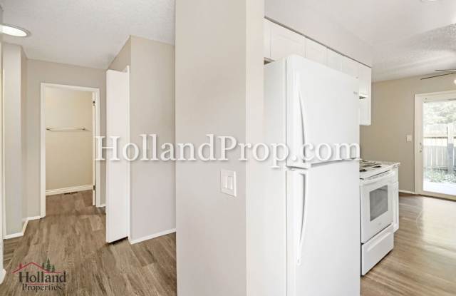 Charming 3-Bedroom Duplex with Fenced Yard, Fireplace & Garage Near Hwy 26! Gallery 4