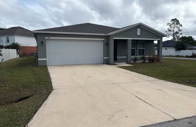 Beautiful 4-Bedroom Corner-Lot Home in Poinciana with 2-Car Garage photos photos