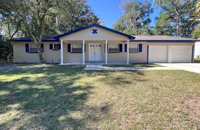 RECENTLY UPDATED 4/2 House with in Pine Estates - Available August photos photos