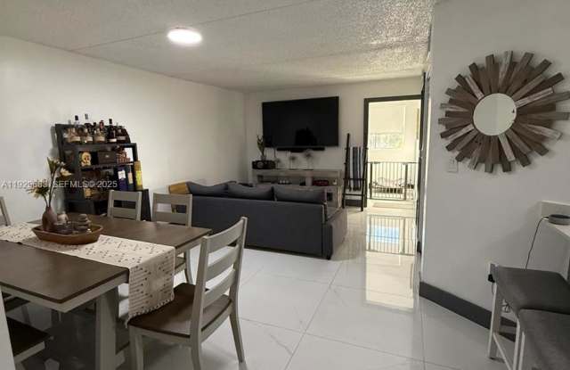 6195 Northwest 186th Street - 6195 Northwest 186th Street, Country Club, FL 33015