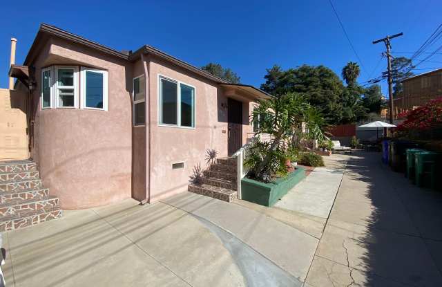 Cozy Two Bedroom Duplex w/ Hardwood Floors! Lovely Kitchen! Lots of Natural Light! photos photos