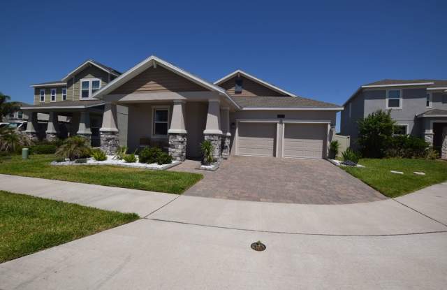 This charming 4 Bedroom, 3 Bath Single Family Home For Rent at 5055 Hatchineha Ct, FL 34787 photos photos