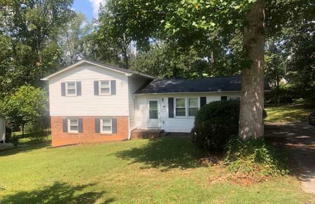 Travelers Rest !! 3 BR, 2 BA with Great Living Space - Den, Bonus Room, Primary Suite has a HUGE walk in Closet, Laundry Room, private screened in porch  deck AND a storage shed out back. Fresh Paint and New LVP Floors photos photos