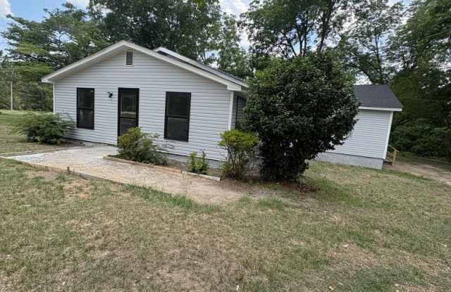 3 Bedroom/1 bath House includes wi-fi, lawncare and security alarm photos photos