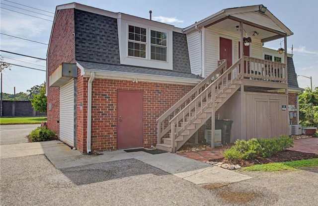 Unique Apartment Above a Business – Convenient to Fort Eustis! photos photos