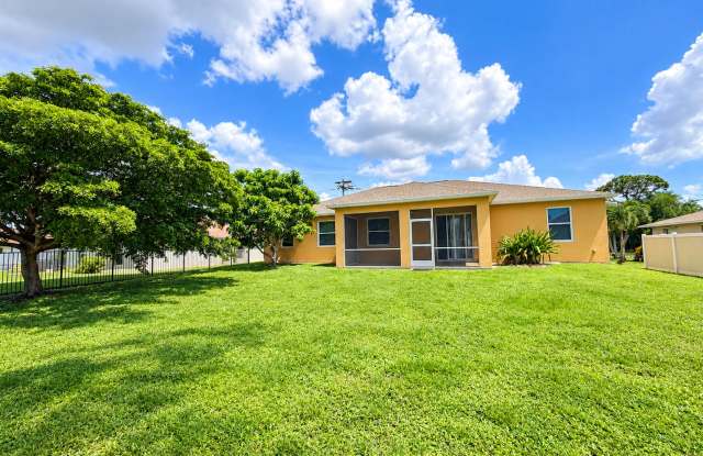 JFK 3 bedroom 2 Bath with oversized  Lanai and  large  backyard.  2 car garage photos photos