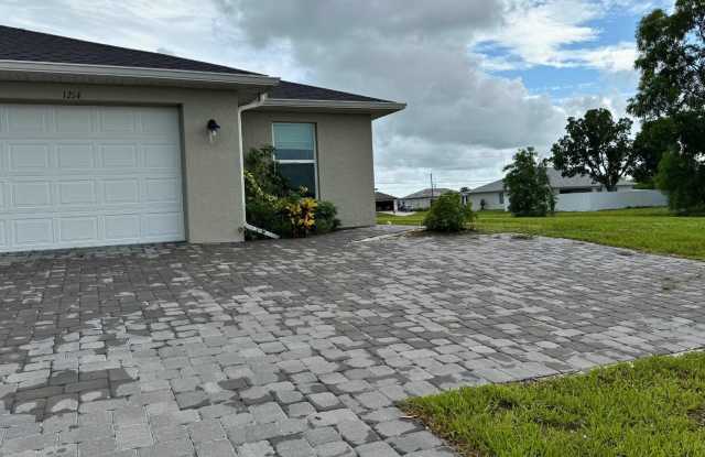 1214 NW 16th Terr - 1214 Northwest 16th Terrace, Cape Coral, FL 33993