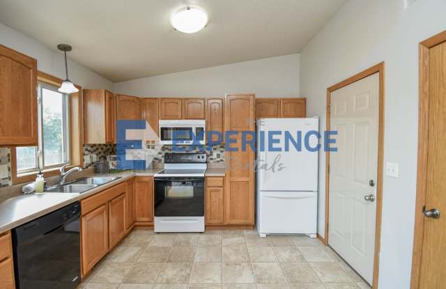 Spacious Ranch Home with 3-Car Garage, Finished Basement & Fenced Yard! Gallery 4