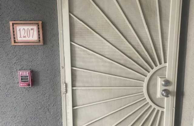 GREAT DOWNSTAIRS UNITIN GATED COMMUNITY LOCATED NEAR STRIP!!! A MUST SEE!!! Gallery 3