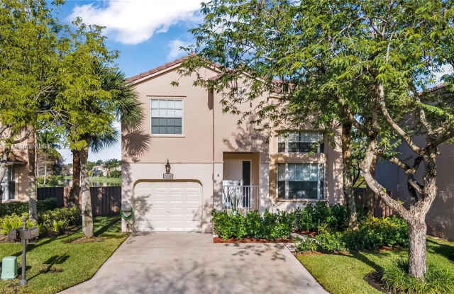 1269 NW 106th Ter photos photos