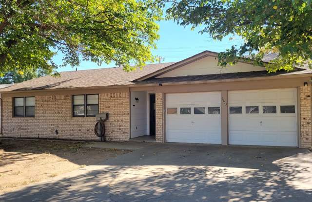 Leasing now! Cozy and comfortable 3/2/2 Brick Home Available July 15th photos photos