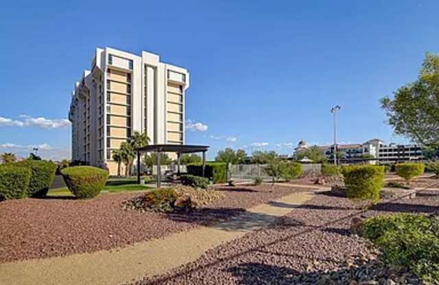 Enjoy resort-style living in this 2 Bed 2 Bath Condo with Stunning Strip Views in the Wimbledon Community in Downtown Las Vegas! photos photos