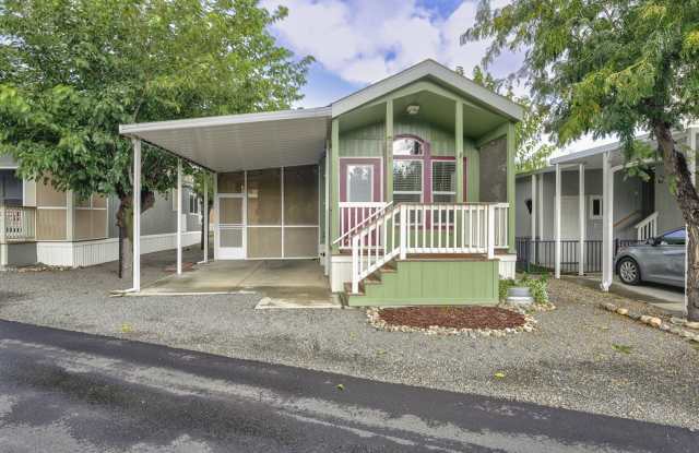 Charming 1-Bedroom Park Model with Enclosed Patio in 55+ Orchard Ranch! Gallery 1