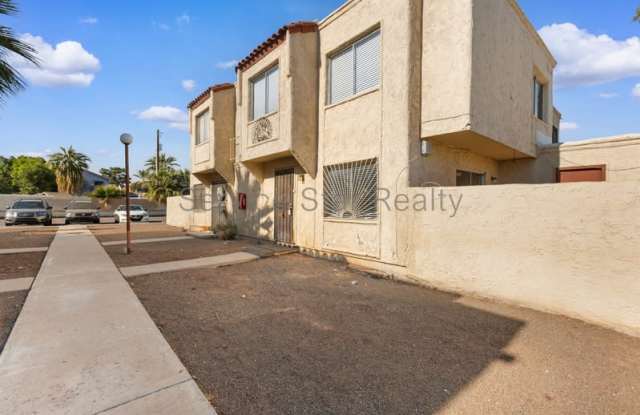 1452 N 54th Ln photos photos