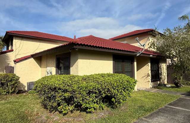 Beautiful Spanish-Style Condo with Mediterranean Style Roof! Basic Cable and Wifi Included! - 399 Hunter Circle, Poinciana, FL 34758