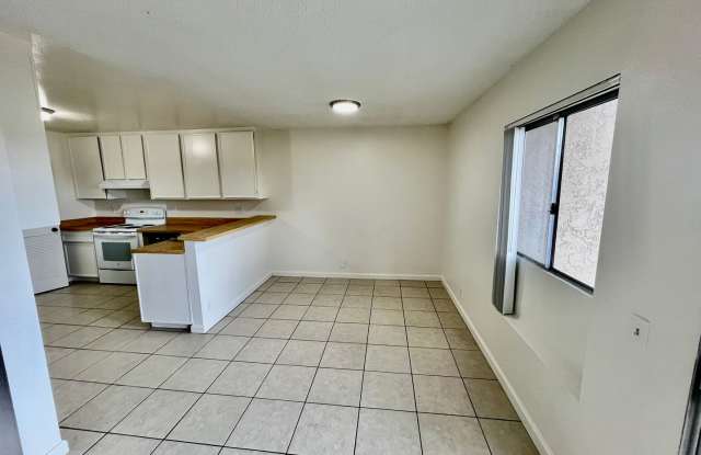 Spacious 2bd/2 bath with private patio in the heart of Paradise Hills.  2 carport spaces Gallery 4
