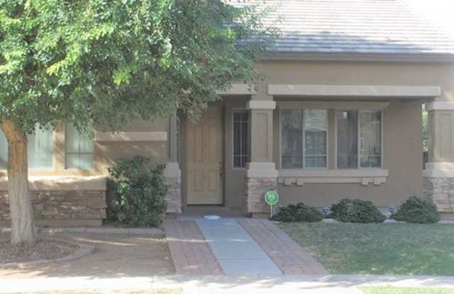 4 bedroom 3.5 bath home in Mountain Gate is available for immediate move in! - 11948 North 143rd Avenue, Surprise, AZ 85379