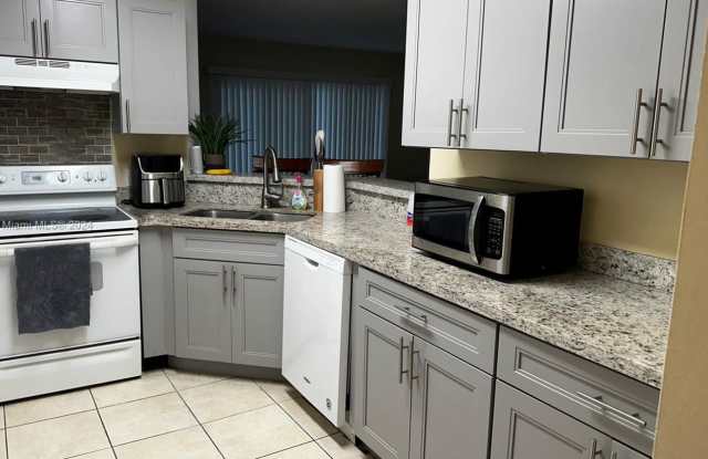 2-bedroom, 2-bathroom condo in a well-maintained gated community, featuring a spectacular direct lake view photos photos