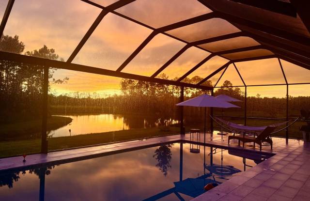 Resort-Style 5BR Luxury Estate with Heated Saltwater Pool  Upcoming Club Access – Two Rivers photos photos