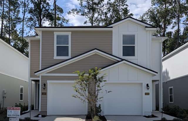 NOW LEASING - NEW 2026 VILLA CONSTRUCTION!! 3/2.5/1 with premium finishes in the a new development community of in Hansen Creek - conveniently located just off I-295 and Lem Turner. Gallery 3