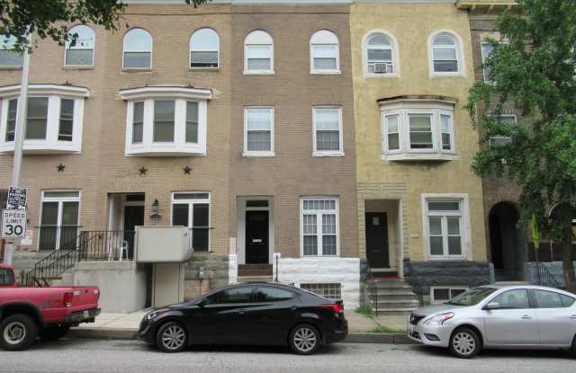 Charming 4 Bedroom/3.5 Bathroom Townhome with Parking Pad in Station North, MD! photos photos