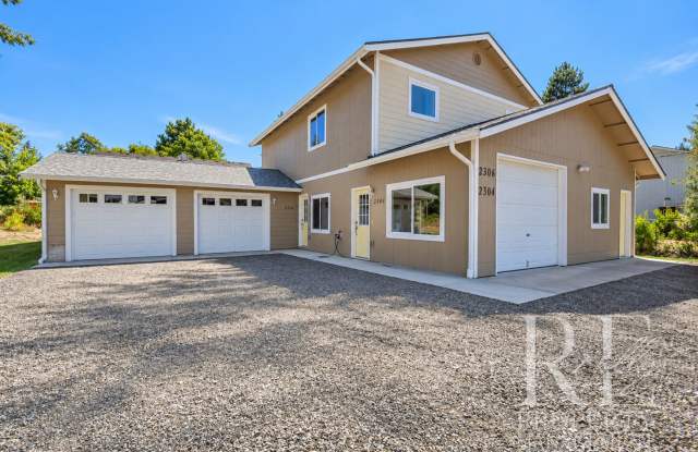 Newly Built 2-Bedroom Upper Duplex with Garage, AC & Designated Parking Gallery 1