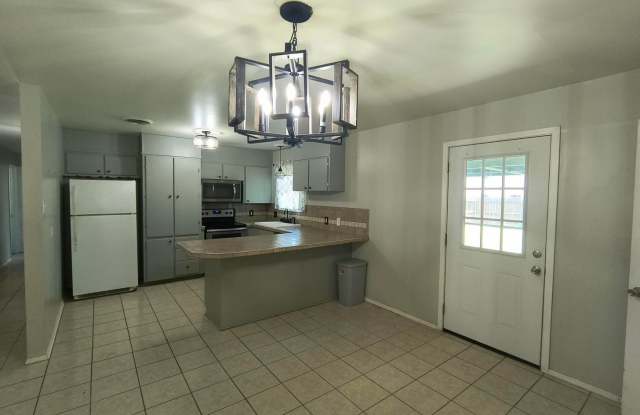 4 bedroom 2 bath College Hills Add home with fenced backyard AVAILABLE NOW! photos photos