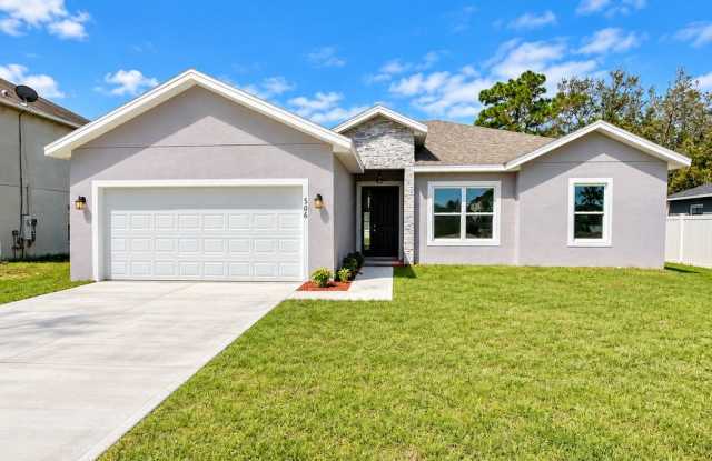 BRAND-NEW 4-Bedroom Home in Poinciana – Stunning Upgrades, Spacious Kitchen & Cable and High-Speed Internet INCLUDED! Gallery 1