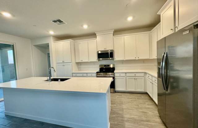 AVAILABLE 7/1/26 - ALMOST NEW 4 BEDROOMS, 3.5 BATHS, UPSTAIRS LOFT, 2 CAR GARAGE BY LENNAR HOMES IN LAKE COMMUNITY IN NORTH NATOMAS photos photos