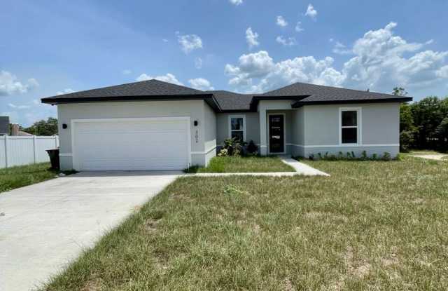 Nearly New 4-Bedroom Gem in Poinciana! photos photos