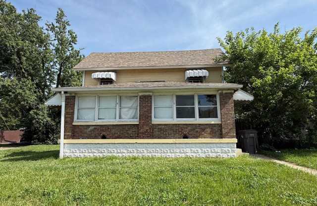 Spacious 3BR/1BA home with great floor plan, detached garage, enclosed porch and main level bedroom photos photos