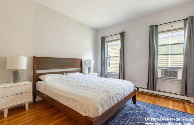 Renovated Apt Near NEU!  Laundry in Unit! 1k Rebate Upon closing with Promo Gallery 3