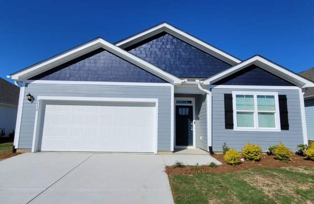 Introducing a stunning 4 bedroom, 2 bathroom house located in the desirable Brunswick Forest community in Leland, - 7112 Foxhollow Lane, Leland, NC 28451 Introducing a stunning 4 bedroom, 2 bathroom house located in the desirable Brunswick Forest community in Leland, - 7112 Foxhollow Lane, Leland, NC 28451