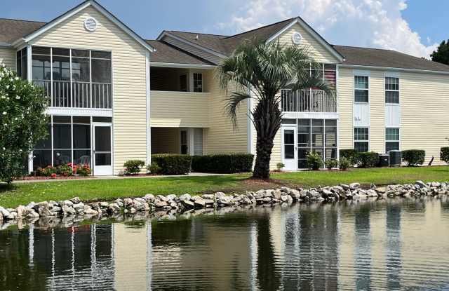 First Floor, Unfurnished, 3 Bedroom, 2 Bath Condo with Screened-in Back Patio! photos photos
