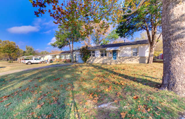 Welcome home to this charming 1955 ranch that's ready for modern living. This 3-bedroom, 1-bath home features beautiful hardwood floors and abundant natural light throughout. photos photos