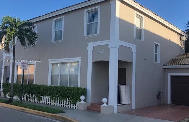 10545 NW 57th CT - 10545 Northwest 57th Court, Coral Springs, FL 33076