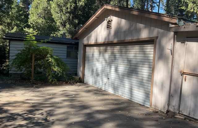 Magalia 2 bed 2 bath home + 2 bonus Rooms with detached garage and carport-partially fenced back yard Gallery 4