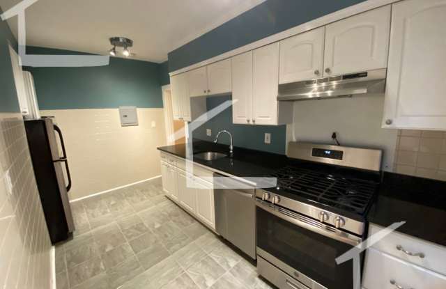 Get a $500 rebate upon closing! Renovated Apt Near T w. Ht  HW included! Luxury Appliances, Sunny rooms! photos photos