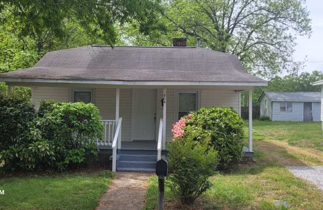 Cute 2 Bed/1 Bath Home - Large Kitchen - Enclosed Sunroom - Covered Front Porch - Storage Shed photos photos