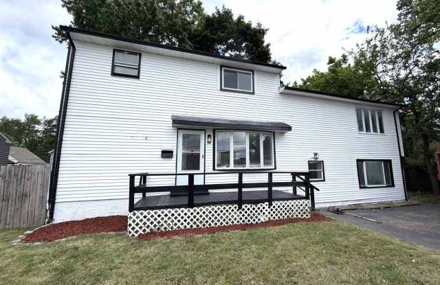 Freshly Updated 6-Bedroom Home with Yard & Driveway photos photos