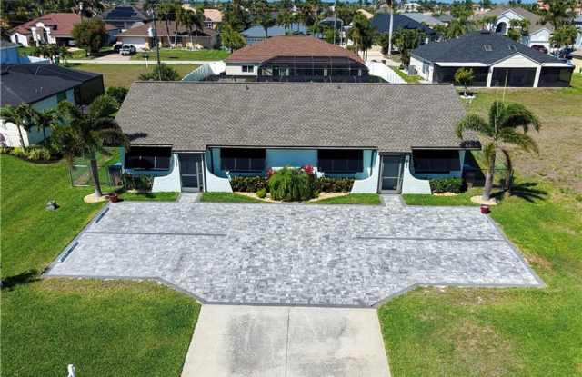 Furnished 2 Bedroom Duplex w/ shared Heated pool Completly updated throughout Gallery 1