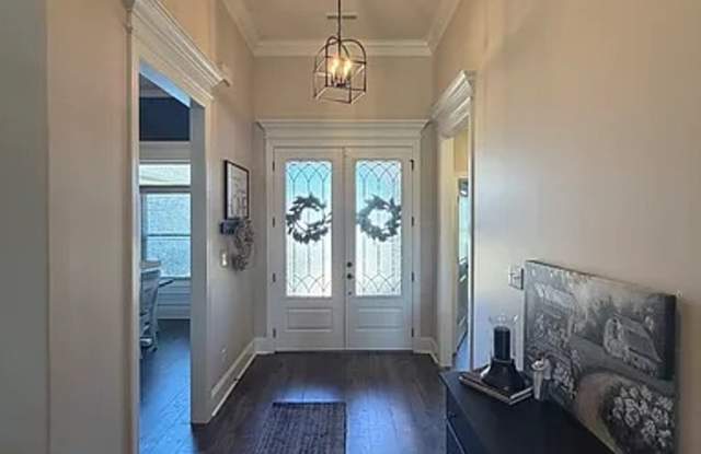 Welcome home to your dream retreat in the stunning Highland Ridge community! Gallery 4