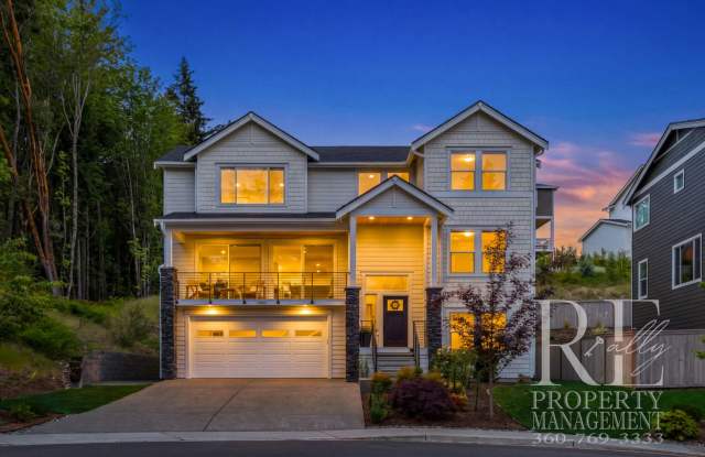Exceptional 3,578 SF Poulsbo Home with Liberty Bay Views, 4-Car Tandem Garage & Designer Kitchen photos photos