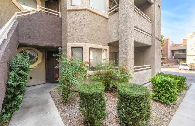 Upgraded Three-Bedroom Condo with Wood Flooring and Modern Comforts! photos photos