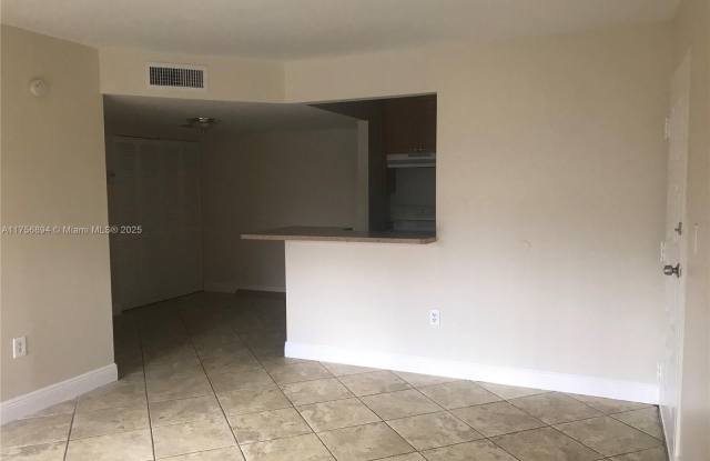 7070 NW 179th St - 7070 Northwest 179th Street, Country Club, FL 33015