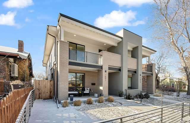 Modern 4BD, 4BA Home With 2-Car Garage, One Block from City Park photos photos